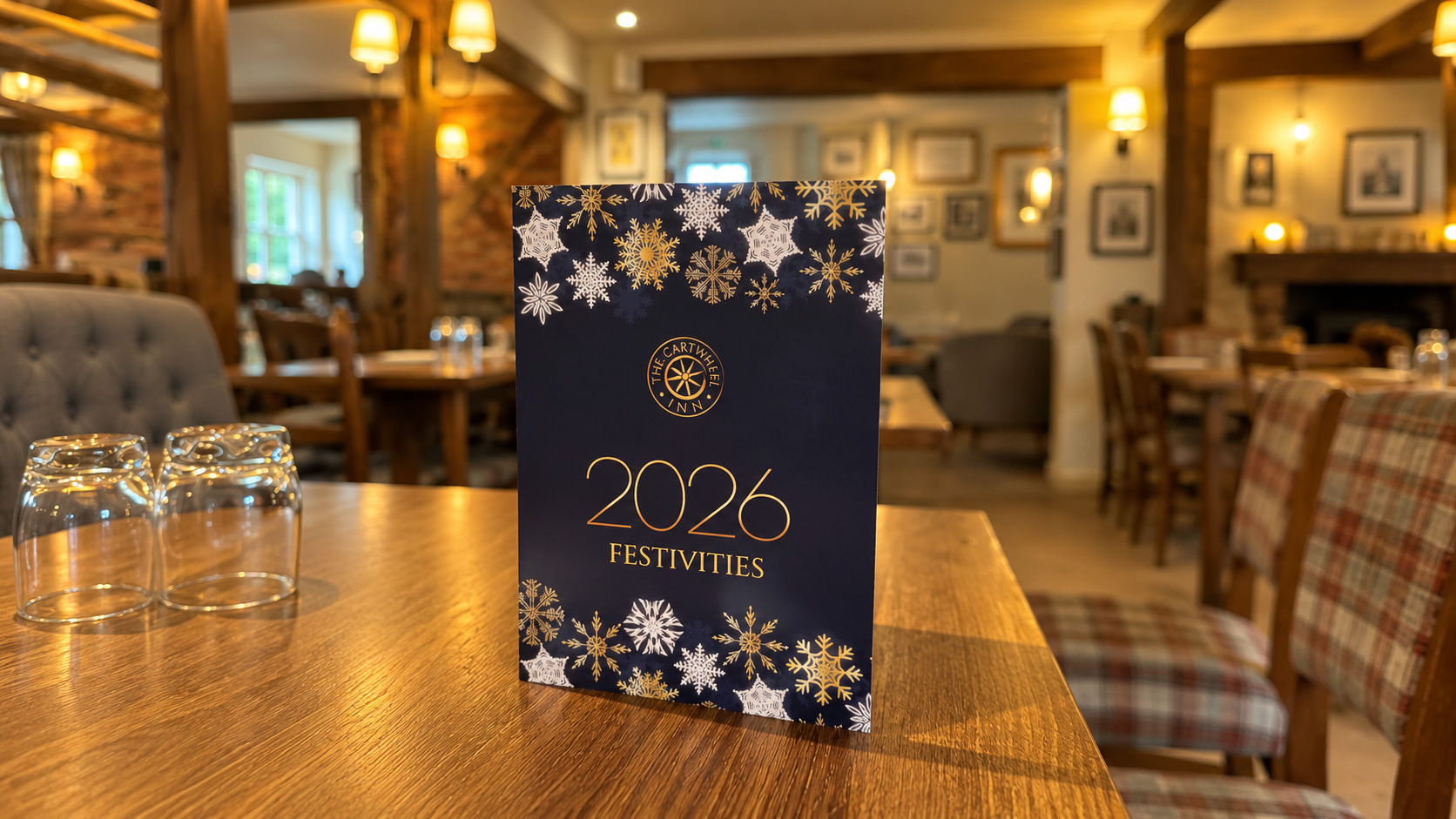 KF:D's printed 2026 festive table display at The Cartwheel Inn in Whitsbury